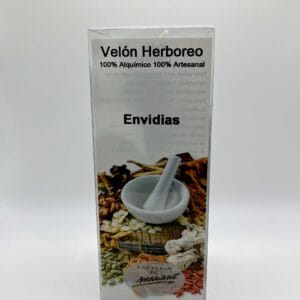 Velón blanco y negro con aceite preparado contra las envidias