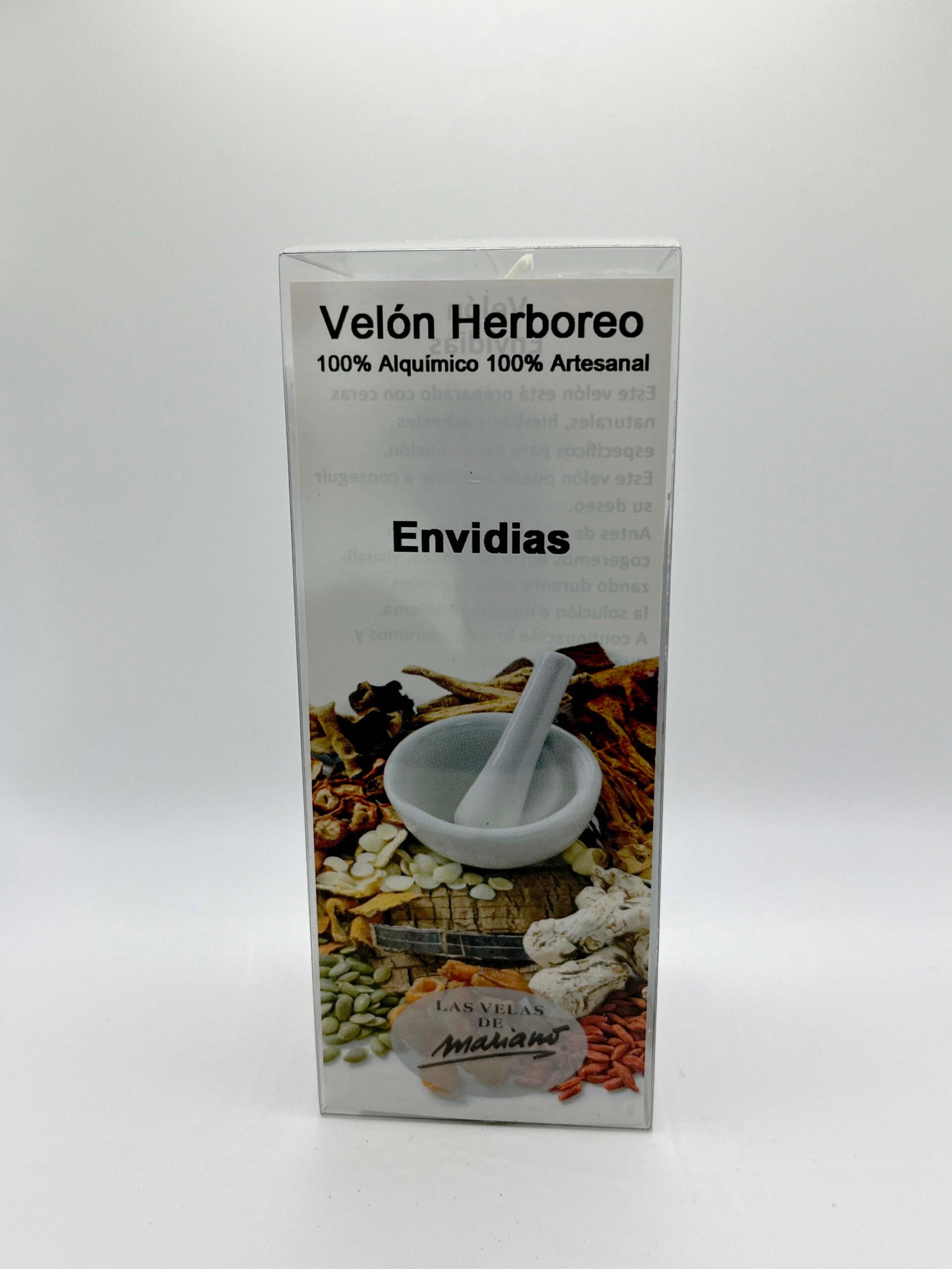 Velón blanco y negro con aceite preparado contra las envidias